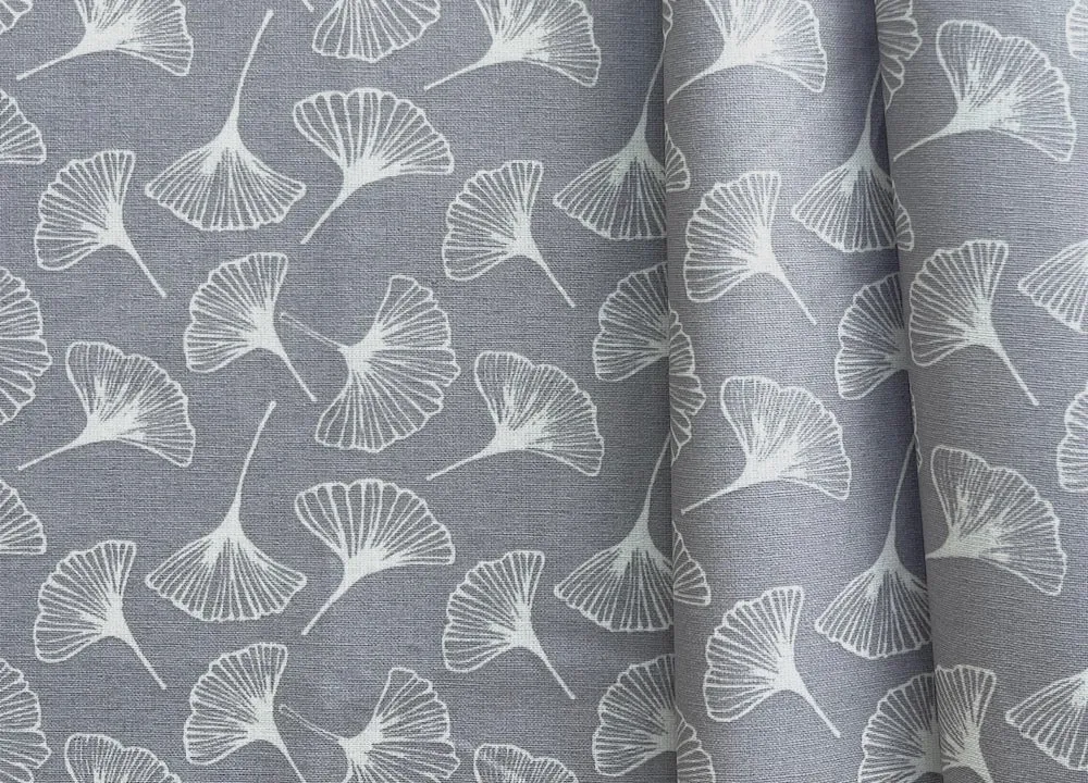 Fluttering White Ginkgo Leaves on Silvery Grey Laminated Cotton (Made in France)