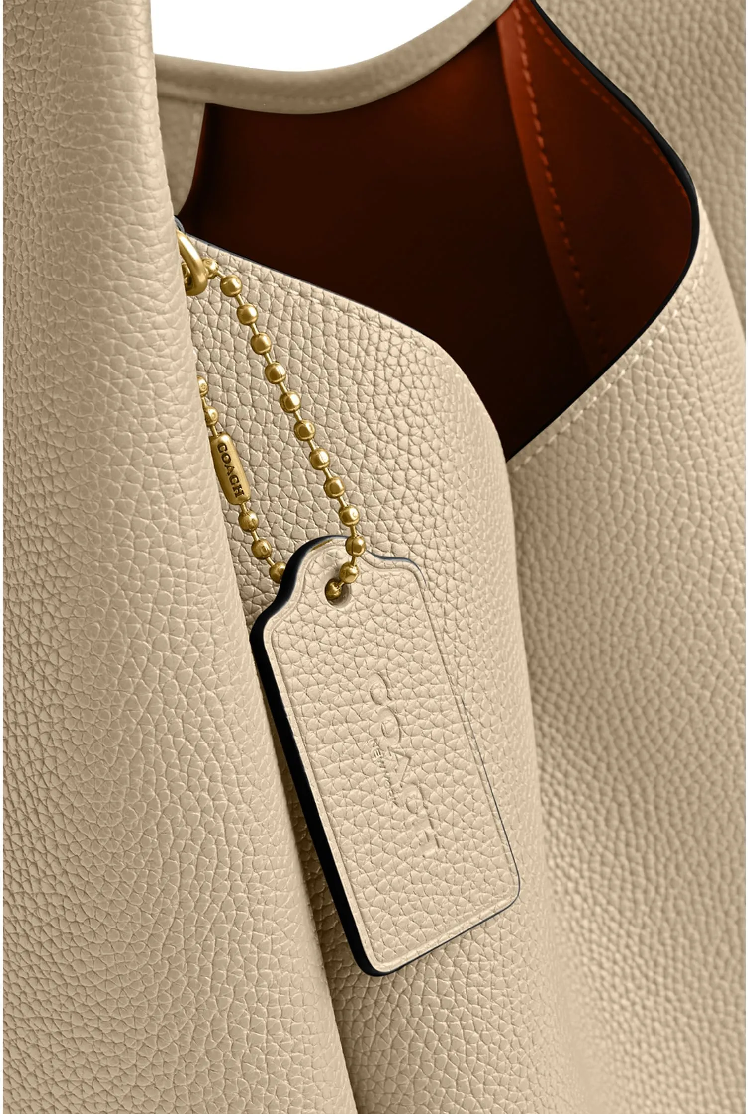 Lana shoulder bag in polished COACH pebbled leather, ivory